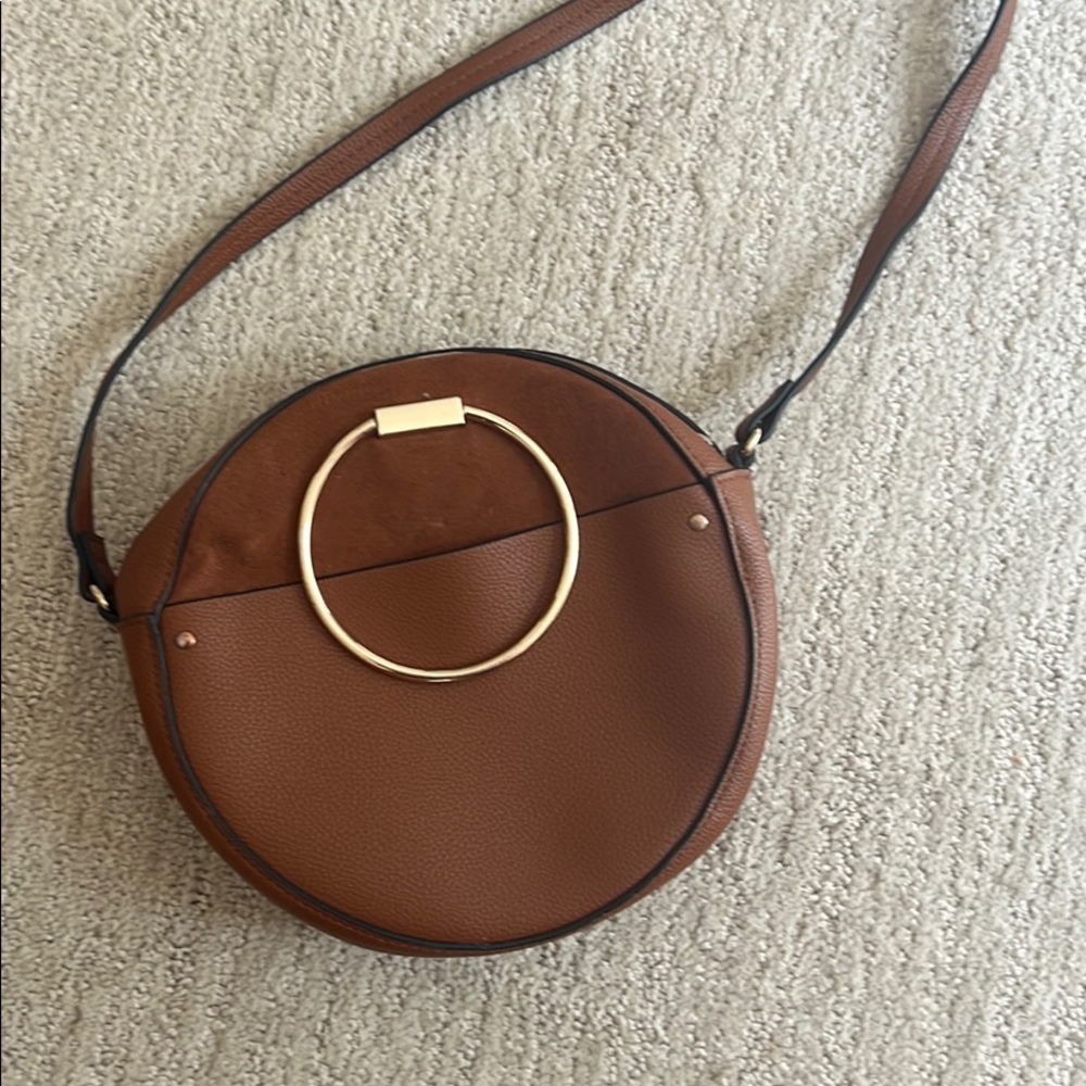 Cross body with gold bangle holder
